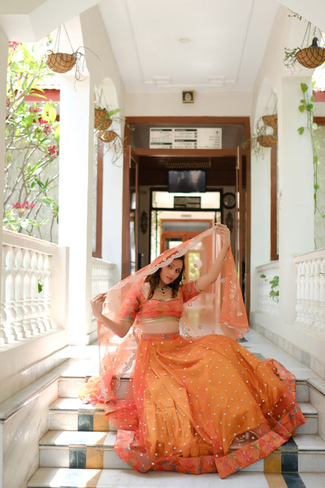 Orange Multicolor Floral Embroidered Net Lehenga