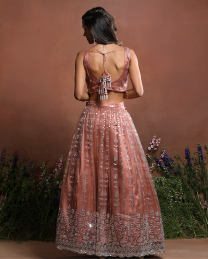 Sleeveless Peach Sparkle Embroidered Net Lehenga