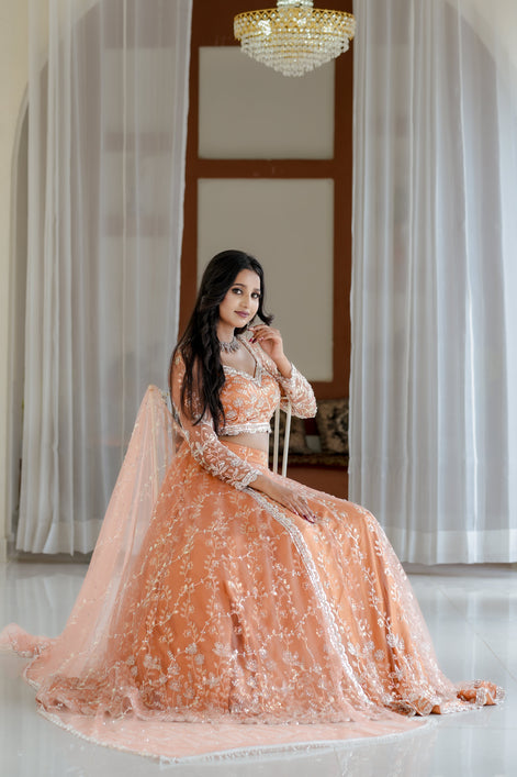 Peach Hand Embroidered Net Lehenga