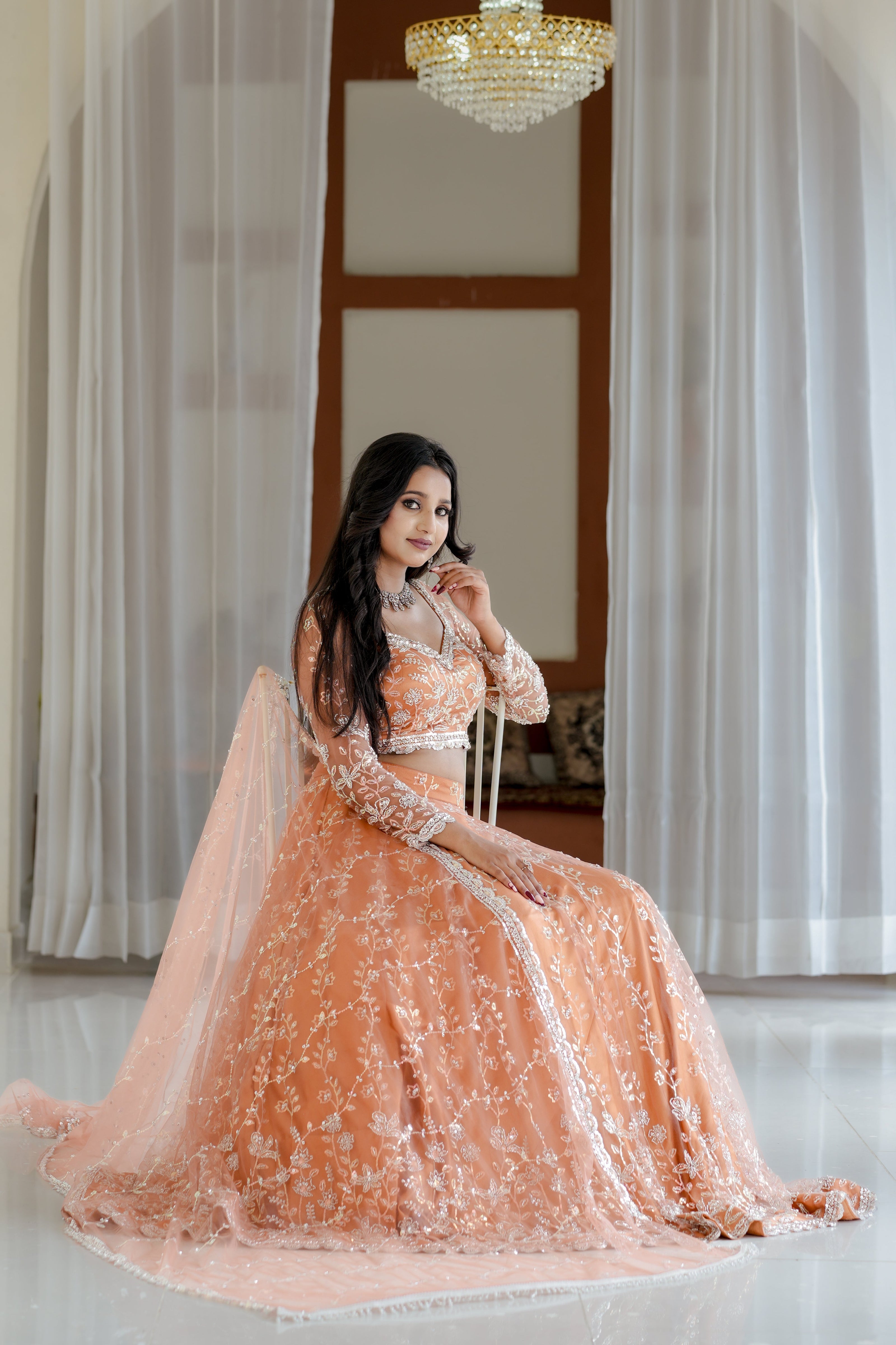 Peach Hand Embroidered Net Lehenga