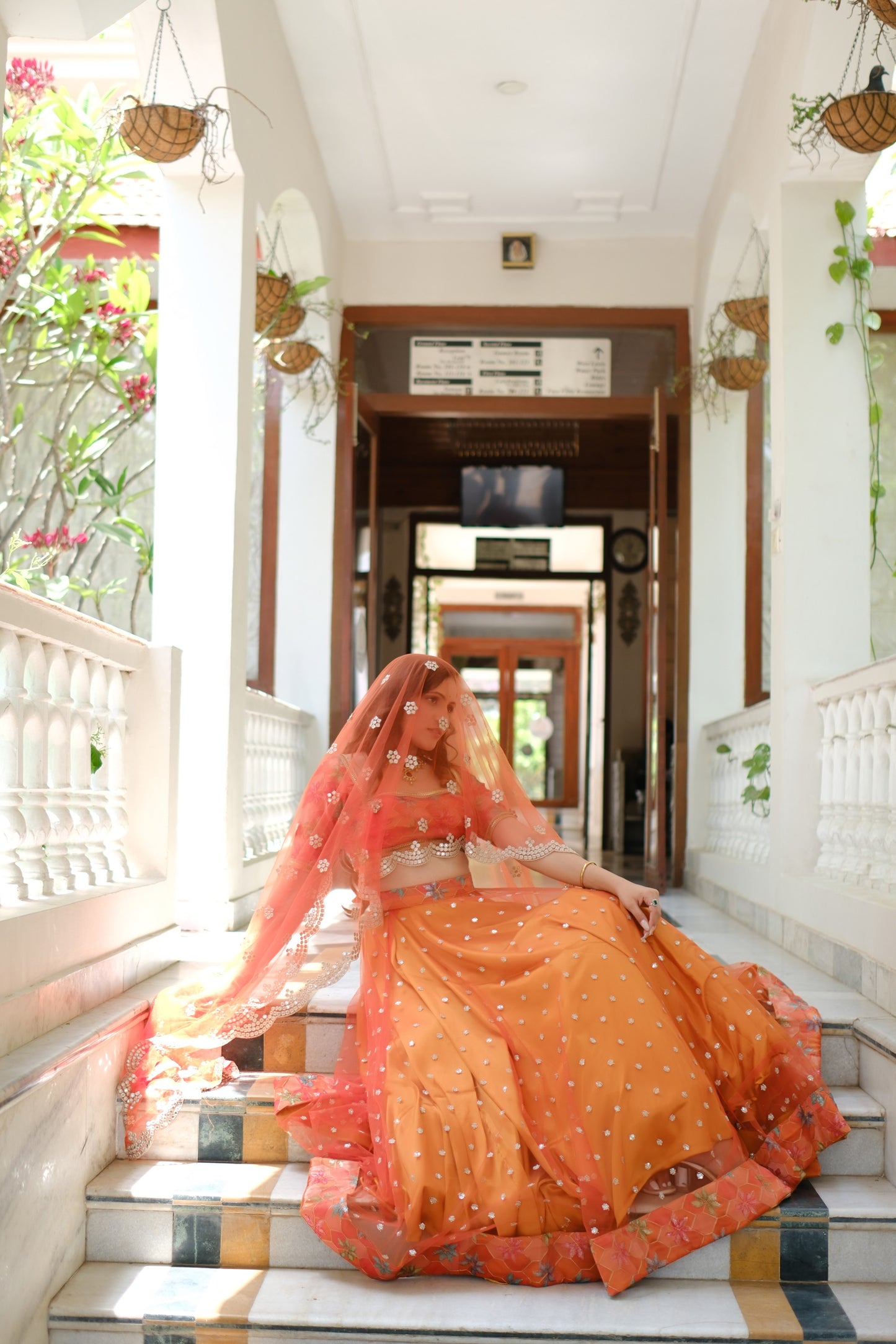 Orange Multicolor Floral Embroidered Net Lehenga