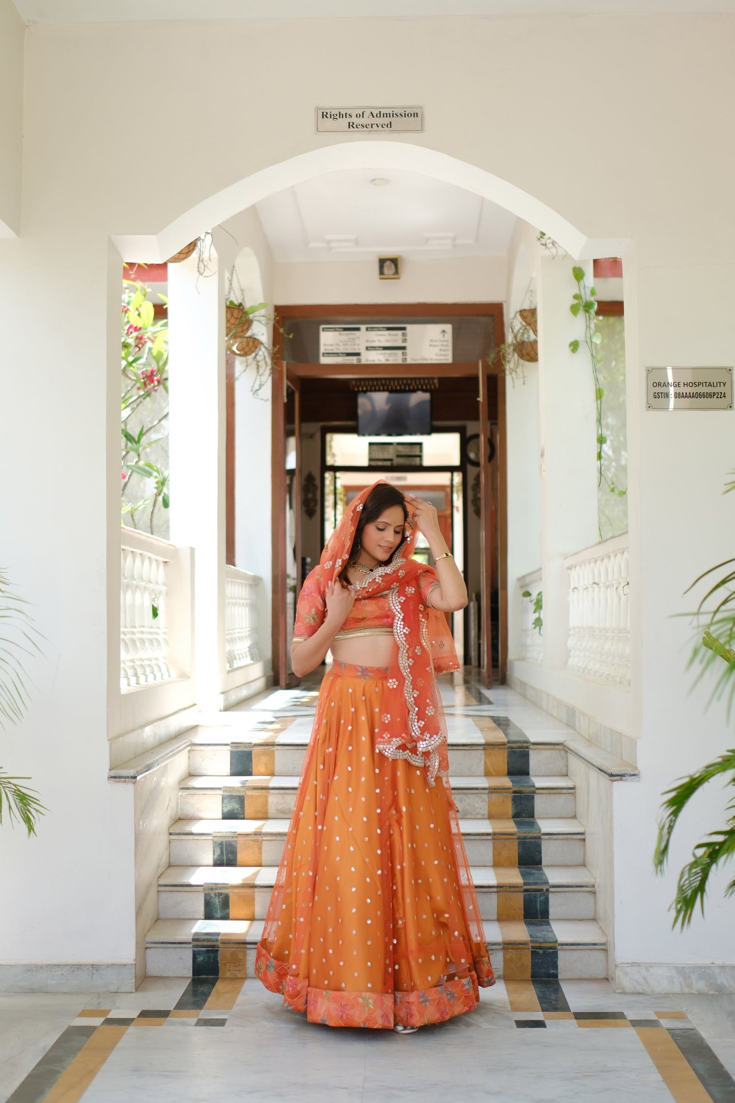 Orange Multicolor Floral Embroidered Net Lehenga