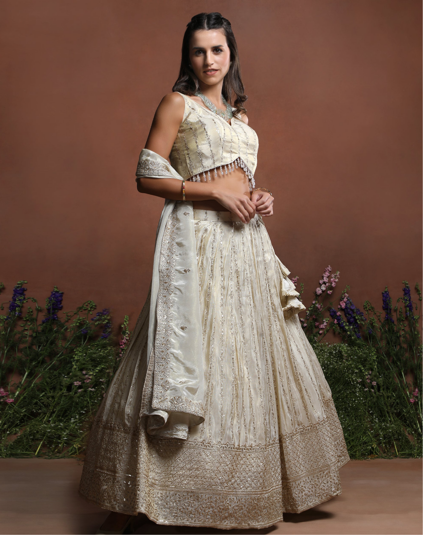 Sleeveless Off-White Embroidered Silk Lehenga